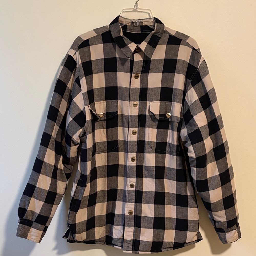 SafTbak men’s lined plaid jacket. It is vintage and well made-brass snap buttons